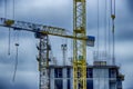 Construction. Tower crane. The process of building residential buildings. Royalty Free Stock Photo