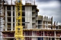 Construction. Tower crane. The process of building residential buildings. Royalty Free Stock Photo