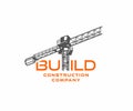 Construction tower crane in construction site logo design. Heavy industrial machinery equipment at building site vector design Royalty Free Stock Photo