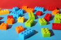 Construction toy. Colorful building bricks on color background, closeup Royalty Free Stock Photo