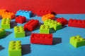 Construction toy. Colorful building bricks on color background, closeup Royalty Free Stock Photo