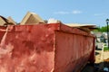 Construction trash dumpsters in an metal container, home house renovation Royalty Free Stock Photo