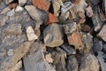 Construction trash, various construction stones, broken bricks, broken foundation and building materials. Bright and excellent bac Royalty Free Stock Photo