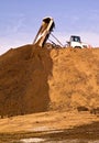 Construction truck tipping dumping raw earth