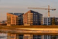 Construction of urban multistory houses scenic view at sunset