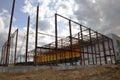 Construction of a warehouse building. Installation of metal structures