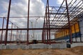 Construction of a warehouse building. Installation of metal structures