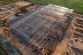 Construction of warehouse from metal structures. Industrial building on light gauge steel framing. Frame of modern hangar or Royalty Free Stock Photo