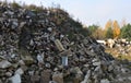 Construction waste reinforced concrete blocks and rusty fittings. Building debris. Ecology, globalization. Concrete slabs, dump