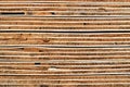 Construction Wood Texture Background: Weathered Cross Section of Piled Plywood Panels - Detail