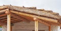 The construction of the wooden and cane roof