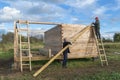 Construction of a wooden house in a rural area