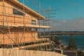 Construction of a wooden house with a sea view Royalty Free Stock Photo