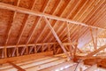 Construction of wooden roof structure intricate framework support beams Royalty Free Stock Photo