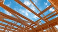 Construction of a Wooden Structure Under a Bright Blue Sky With Scattered Clouds During Daylight Hours Royalty Free Stock Photo