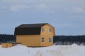 Construction of a wooden two-storey house. Royalty Free Stock Photo