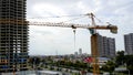 A construction work and a crane in a city