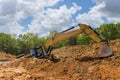 During construction work the excavator stuck in a clay pit Royalty Free Stock Photo