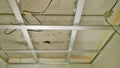 Construction work at home, fitting design for plasterboard ceiling