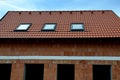 construction work on a house made of modern insulating bricks.