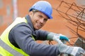 construction worker adjusting metalic structure Royalty Free Stock Photo
