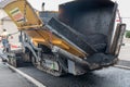 Asphalting with asphalt paver