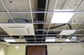 Construction worker assemble a suspended ceiling Royalty Free Stock Photo