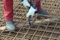 Construction worker assembling iron frame Royalty Free Stock Photo