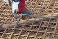 Construction worker assembling iron frame Royalty Free Stock Photo