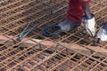 Construction worker assembling iron frame Royalty Free Stock Photo