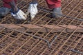 Construction worker assembling iron frame Royalty Free Stock Photo