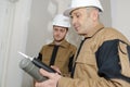 Construction worker assembling silicone gun Royalty Free Stock Photo