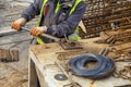 Bending rebar using manual bending machine Royalty Free Stock Photo