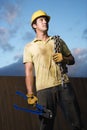 Construction Worker with Bolt Cutters and Chain