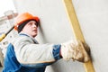 Construction worker. Builder concreter with level Royalty Free Stock Photo