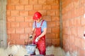 Construction worker, builder, working on construction site. Royalty Free Stock Photo