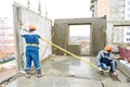 Construction worker. Builders concreter joiners at work