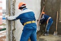 Construction worker. Builders concreter joiners at work