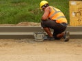 Construction worker building a street..