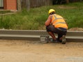 Construction worker building a street..