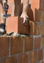 Construction worker building a wall