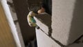 Construction worker building a wall with lightweight concrete blocks Royalty Free Stock Photo