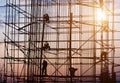 Construction worker bundling steel structure