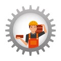 Construction worker carrying bricks inside gear Royalty Free Stock Photo