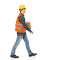 Construction worker carrying package. Royalty Free Stock Photo