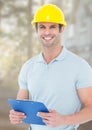 Construction Worker with chart in front of construction site Royalty Free Stock Photo