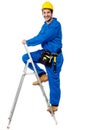 Construction worker climbing up the step ladder Royalty Free Stock Photo