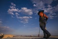 Construction worker commencing inspection maintenance services on top of the high rise building