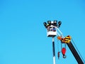 Construction worker using lifting boom machinery Royalty Free Stock Photo