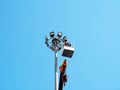 Construction worker using lifting boom machinery Royalty Free Stock Photo